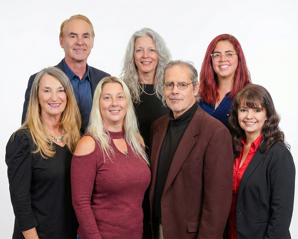 employee headshots and team huddle